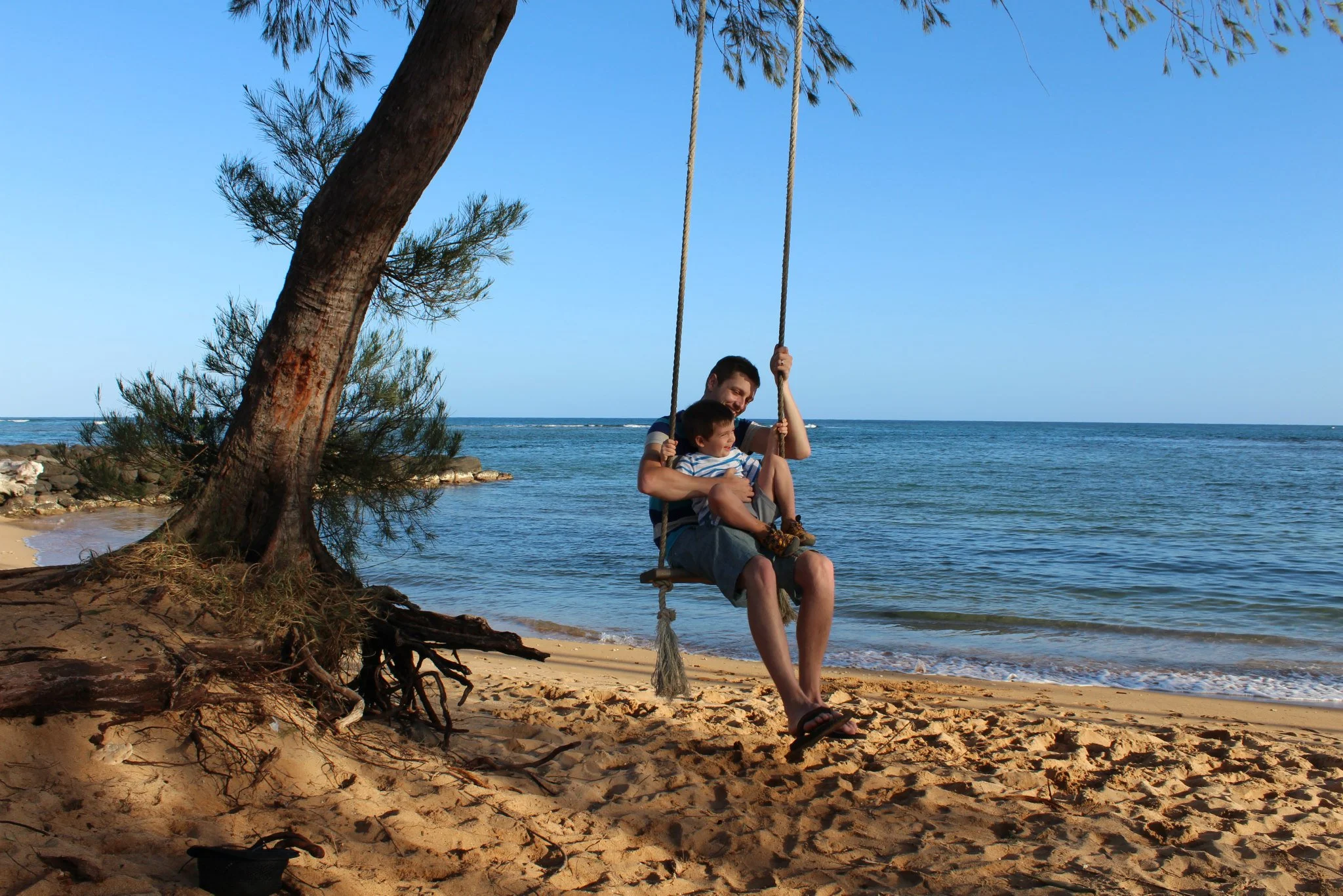 Wells and Daddy swinging. 